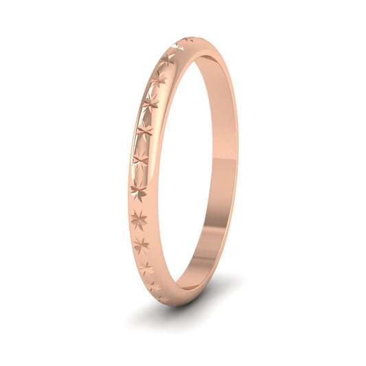 <p>18ct Rose Gold Centre Star Pattern Wedding Ring.  2mm Wide </p>