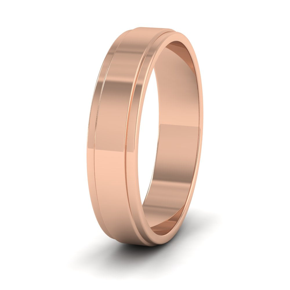 <p>9ct Rose Gold Stepped Edge Pattern Flat Wedding Ring.  5mm Wide </p>