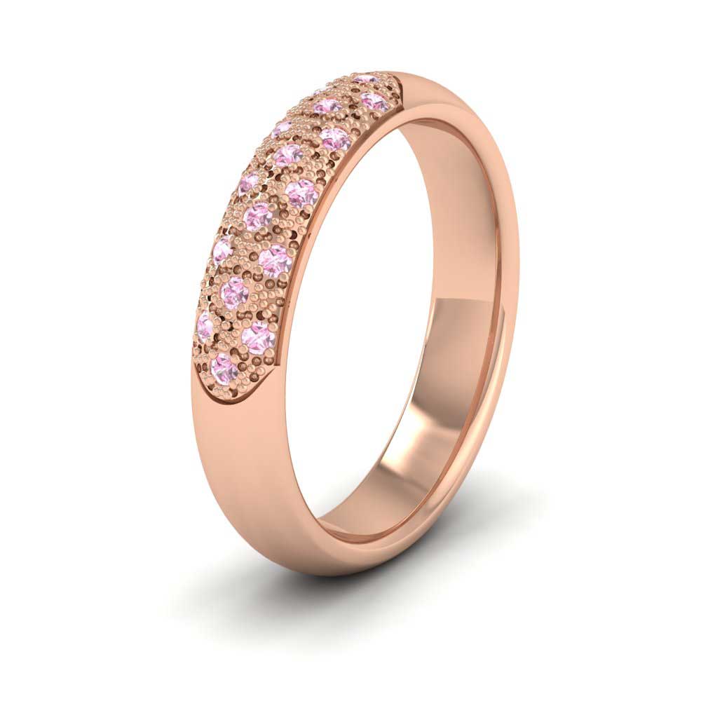 <p>18ct Rose Gold Pave Set Pink Sapphire Wedding Ring.  4mm Wide And Court Shaped For Comfortable Fitting</p>