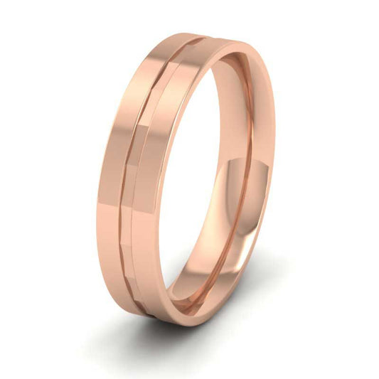 <p>18ct Rose Gold Flat Facetted Groove Flat Wedding Ring.  5mm Wide And Court Shaped For Comfortable Fitting</p>