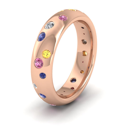 <p>18ct Rose Gold Scatter Diamond And Sapphire Set Wedding Ring (0.13ct Of Diamonds And 0.5ct Of Pink, Blue And Yellow Sapphires).  5mm Wide And Court Shaped For Comfortable Fitting</p>