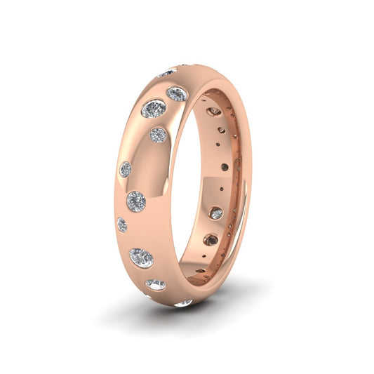 <p>9ct Rose Gold Scatter Diamond Set Wedding Ring (0.52ct).  5mm Wide And Court Shaped For Comfortable Fitting</p>