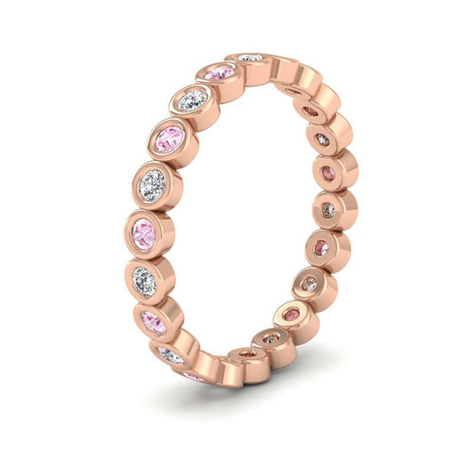 <p>Pink Sapphire And Diamond Ring In 9ct Rose Gold .  25mm Wide </p>