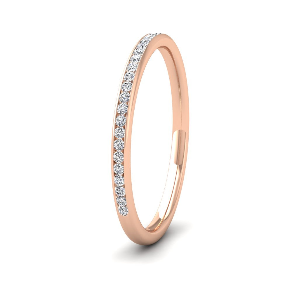 <p>18ct Rose Gold Half Channel Set 0.13ct Round Brilliant Cut Diamond Wedding Ring.  15mm Wide And Court Shaped For Comfortable Fitting</p>
