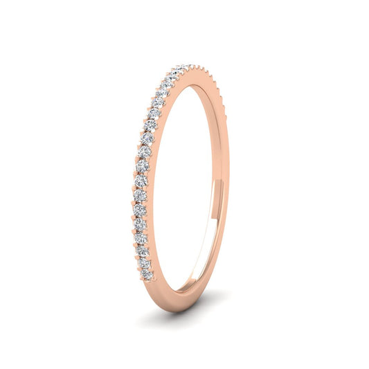 <p>18ct Rose Gold Round Claw 0.13ct Half Diamond Set Wedding Ring.  15mm Wide And Court Shaped For Comfortable Fitting</p>