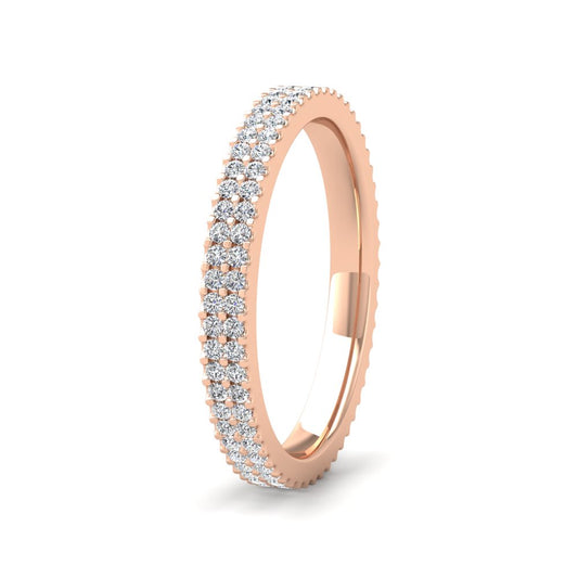 <p>18ct Rose Gold Two Row Round Claw 0.5ct Full Diamond Set Wedding Ring.  25mm Wide And Court Shaped For Comfortable Fitting</p>