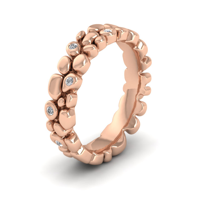 <p>Pebbles Wedding Ring In 18ct Rose Gold With Diamonds.  5mm Wide And Court Shaped For Comfortable Fitting</p>