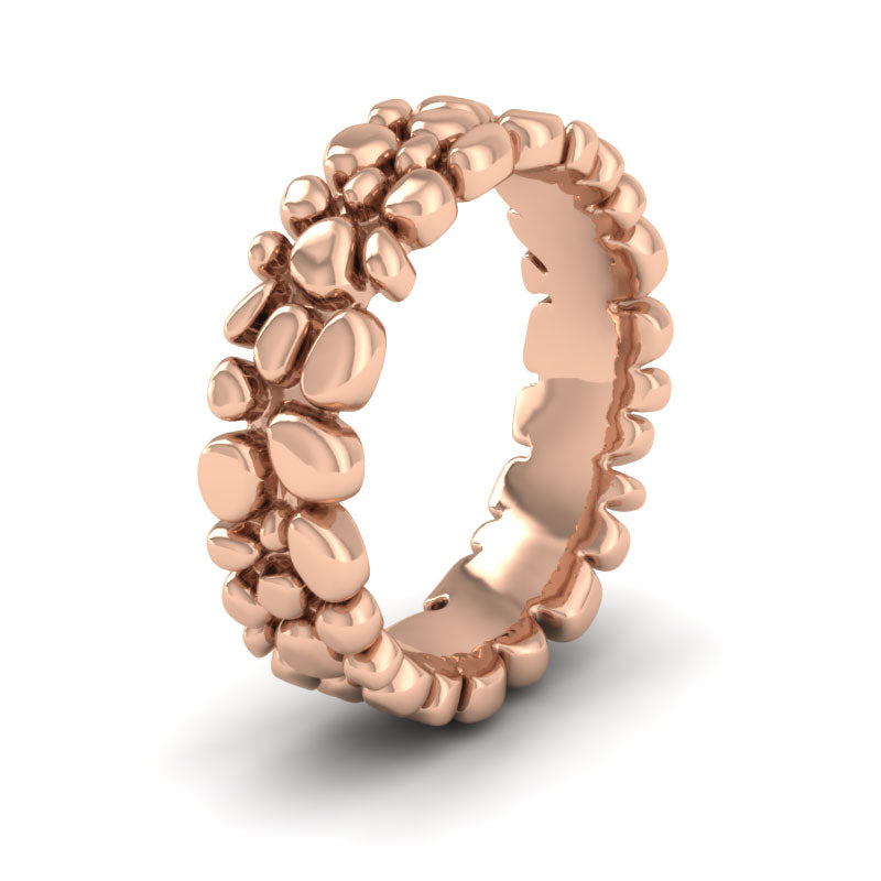 <p>Pebbles Wedding Ring In 18ct Rose Gold.  7mm Wide And Court Shaped For Comfortable Fitting</p>