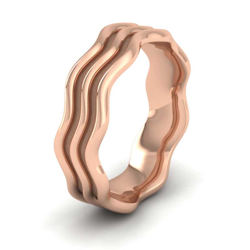 <p>18ct Rose Gold Triple Wave Wedding Ring.  6mm Wide And Court Shaped For Comfortable Fitting (Overall 7mm Wide From Outer Waves)</p>