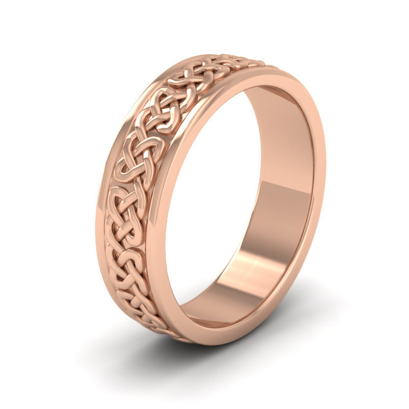 <p>Celtic Pattern With Edge Flat Wedding Ring In 18ct Rose Gold With Edge.  6mm Wide </p>