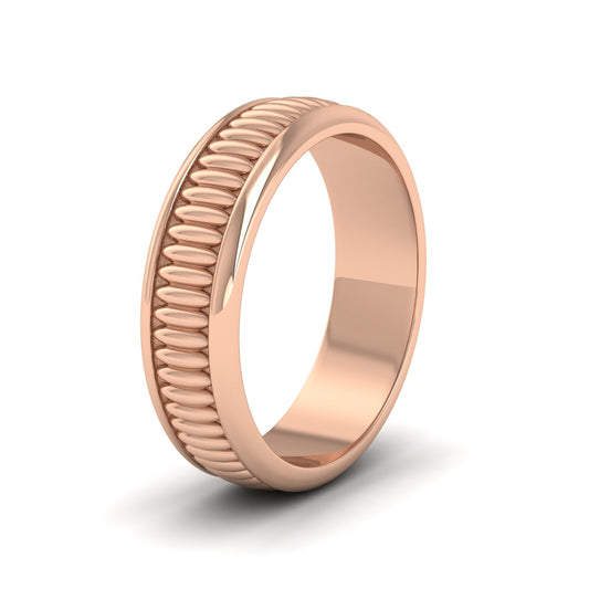<p>Raised Oval Bump And Edged Wedding Ring In 9ct Rose Gold.  6mm Wide </p>