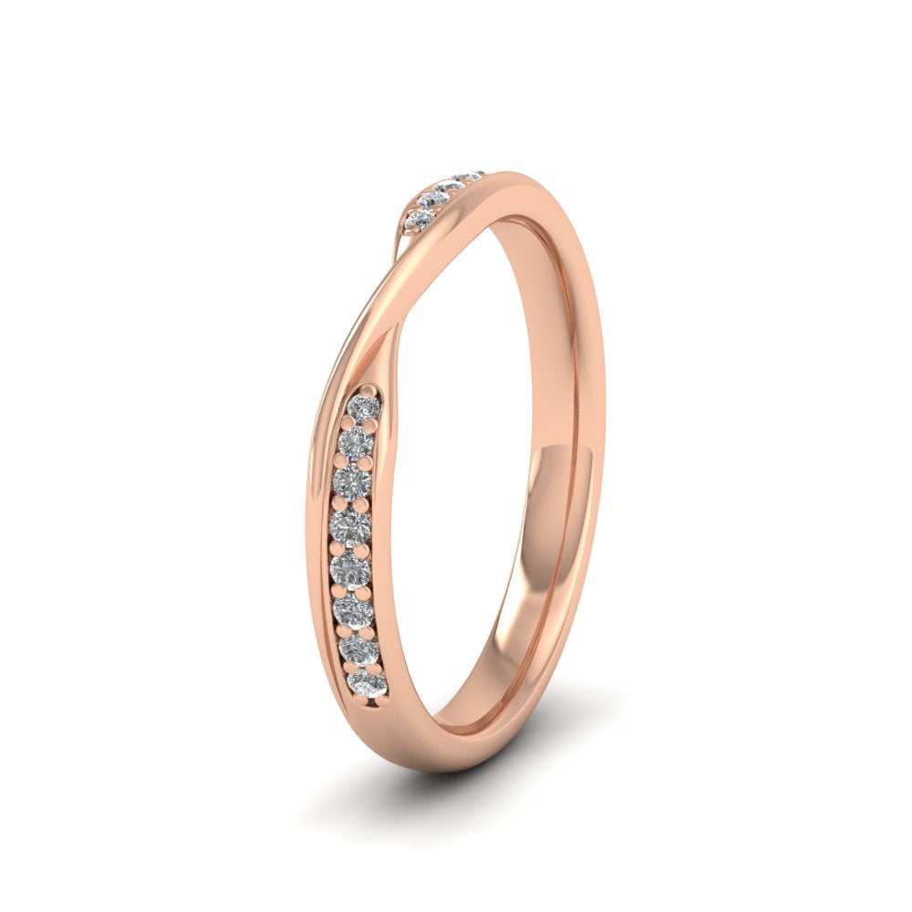 <p>9ct Rose Gold Crossover Pattern Wedding Ring With Sixteen Set Diamonds.  25mm Wide And Court Shaped For Comfortable Fitting.  Suitable For Fitting Next To Single Stone Rings Where The Stone And Setting Protrude Up To 0.75mm Away From The Edge Of The Ring.</p>