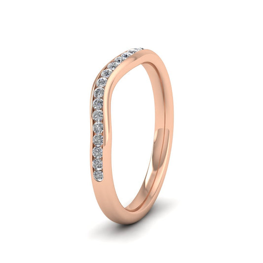 <p>9ct Rose Gold Curved To Fit Channel Set Diamond Wedding Ring.  225mm Wide And Court Shaped For Comfortable Fitting.  Suitable For Fitting Next To Single Stone Rings Where The Stone And Setting Protrude Up To 1.5mm Away From The Edge Of The Ring.</p>