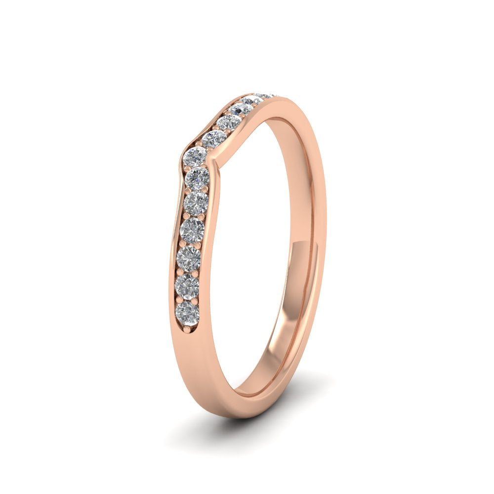 <p>18ct Rose Gold Slight Wishbone Shaped Bead Set Diamond Wedding Ring.  225mm Wide And Court Shaped For Comfortable Fitting.  Suitable For Fitting Next To Single Stone Rings Where The Stone And Setting Protrude Slightly.</p>