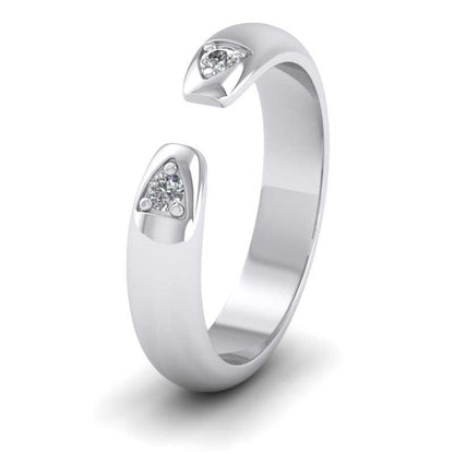 <p>14ct White Gold Split Two Diamond Set Wedding Ring.  4mm Wide </p>