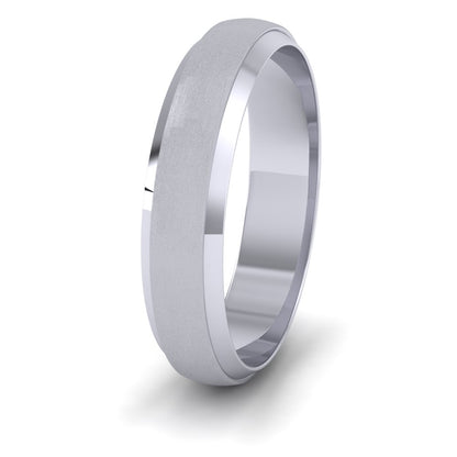 <p>18ct White Gold Flat Edge Patterned And Matt Finish Wedding Ring.  5mm Wide </p>