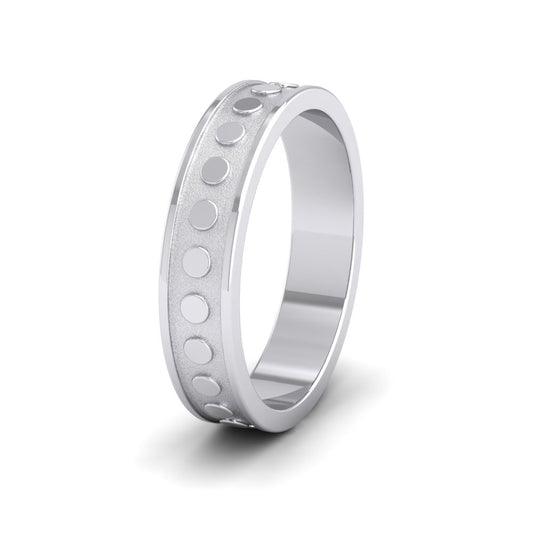 <p>18ct White Gold Raised Circle And Edge Patterned Flat Wedding Ring.  5mm Wide </p>