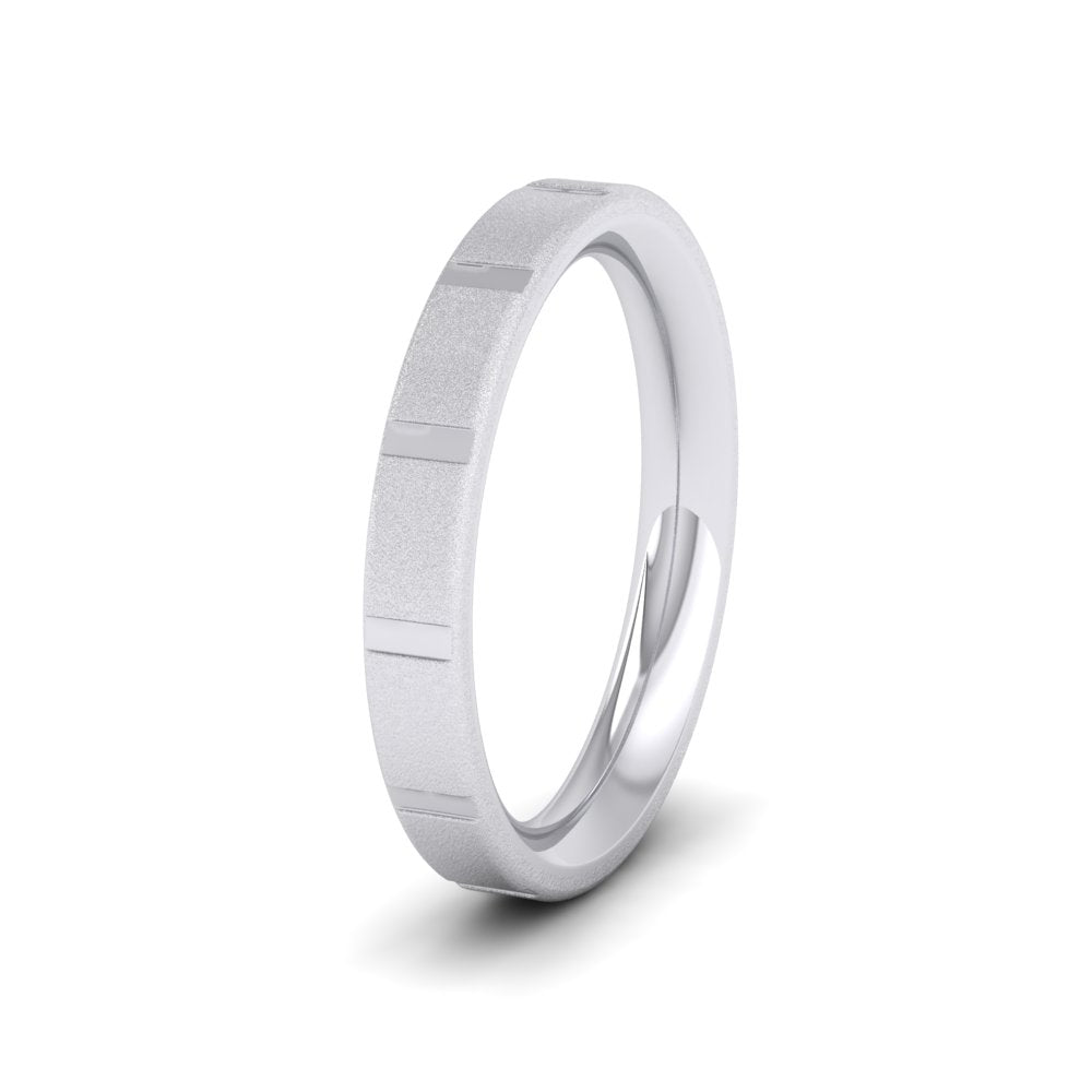 <p>18ct White Gold Soft Edged And Patterned Flat Wedding Ring.  3mm Wide And Court Shaped For Comfortable Fitting.  With A Fine Sparkle Finish</p>