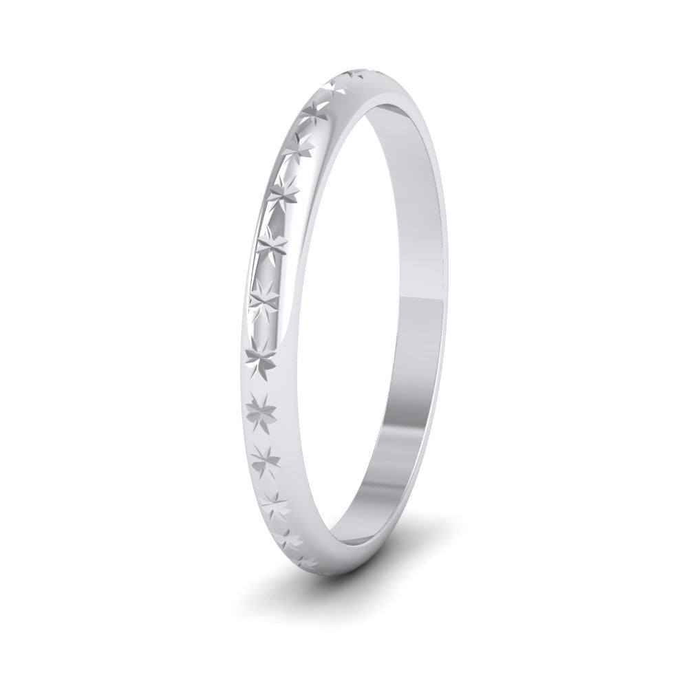 <p>9ct White Gold Centre Star Pattern Wedding Ring.  2mm Wide </p>