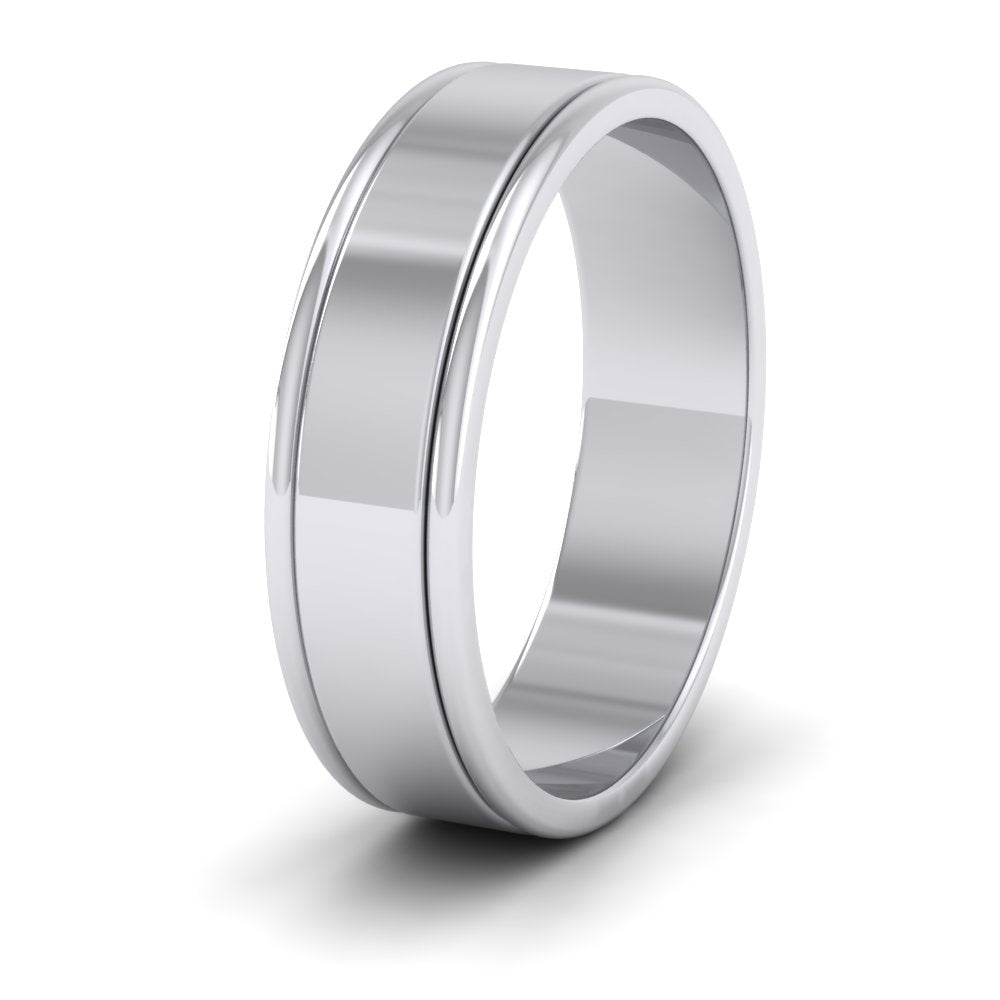 <p>18ct White Gold Rounded Edge Grooved Pattern Flat Wedding Ring.  6mm Wide </p>