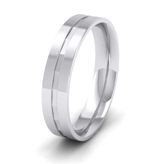 <p>18ct White Gold Flat Facetted Groove Flat Wedding Ring.  5mm Wide And Court Shaped For Comfortable Fitting</p>