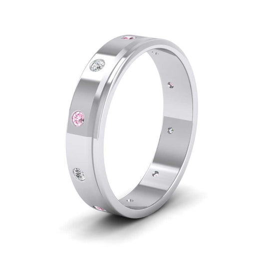 <p>950 Palladium Diamond And Pink Sapphire Set Flat Line Patterned Wedding Ring.  4mm Wide </p>