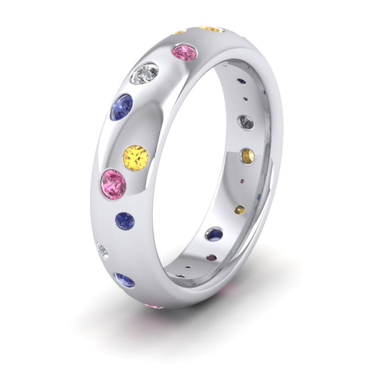 <p>950 Platinum Scatter Diamond And Sapphire Set Wedding Ring (0.13ct Of Diamonds And 0.5ct Of Pink, Blue And Yellow Sapphires).  5mm Wide And Court Shaped For Comfortable Fitting</p>