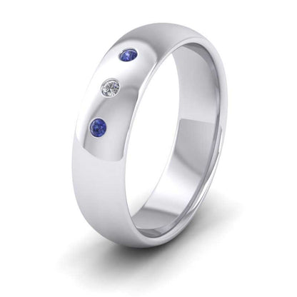<p>950 Palladium Blue Sapphire And Diamond Flush Set Wedding Ring.  6mm Wide And Court Shaped For Comfortable Fitting</p>