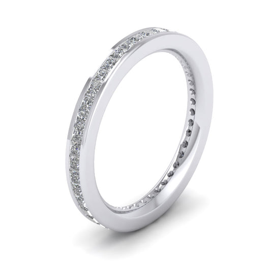 <p>Full Channel Set Princess Cut Diamond (0.9ct) Wedding Ring In 18ct White Gold.  25mm Wide And Court Shaped For Comfortable Fitting</p>