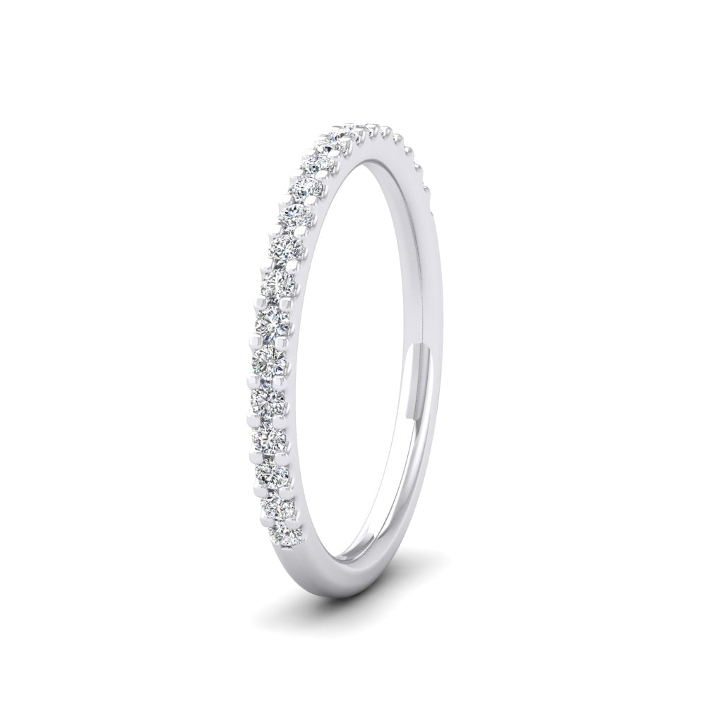 <p>18ct White Gold Round Claw 0.25ct Half Diamond Set Wedding Ring.  2mm Wide And Court Shaped For Comfortable Fitting</p>