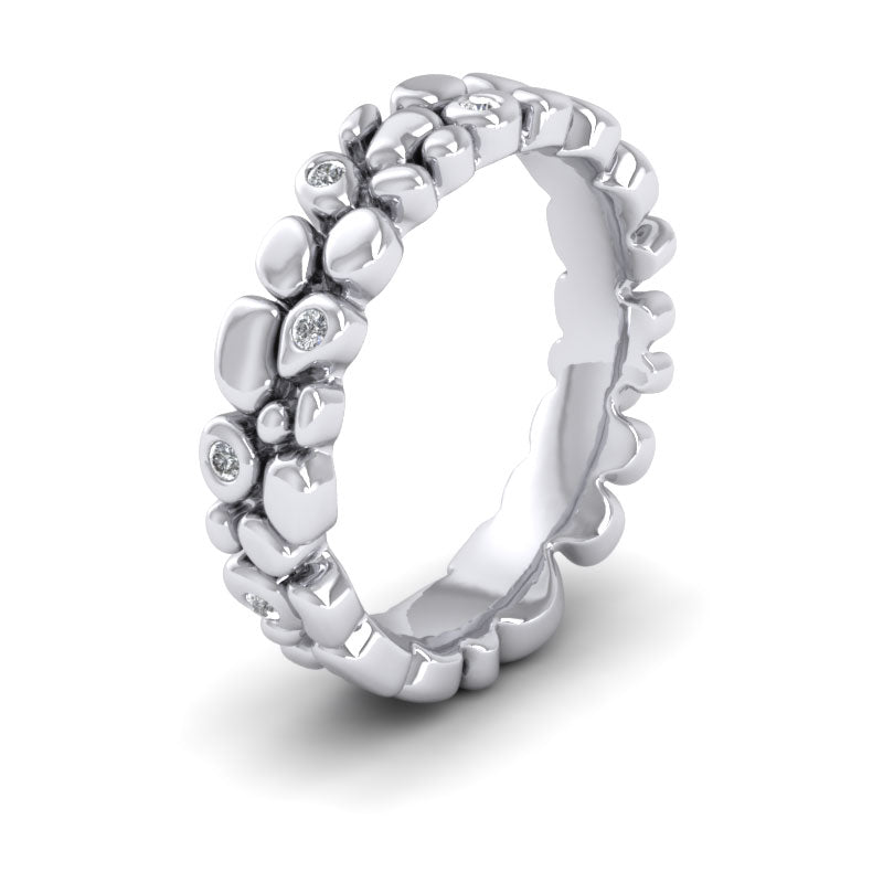 <p>Pebbles Wedding Ring In 14ct White Gold With Diamonds.  5mm Wide And Court Shaped For Comfortable Fitting</p>