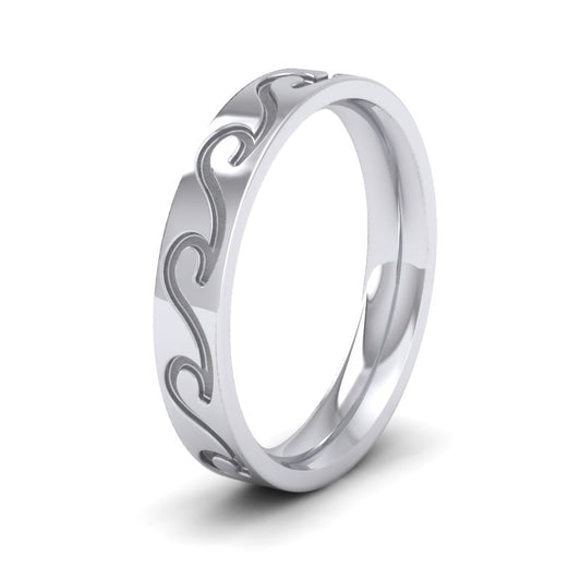 <p>18ct White Gold Wave Pattern Flat Wedding Ring.  4mm Wide And Court Shaped For Comfortable Fitting</p>