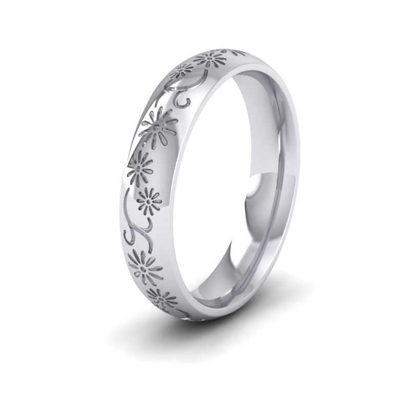 <p>14ct White Gold Daisy Pattern Wedding Ring.  4mm Wide And Court Shaped For Comfortable Fitting</p>