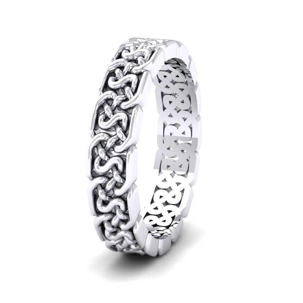 <p>Open Celtic Patterned Wedding Ring In 14ct White Gold .  4mm Wide </p>