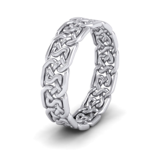 <p>Open Celtic Patterned Wedding Ring In 18ct White Gold .  6mm Wide </p>