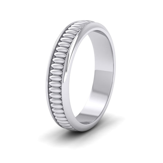 <p>Raised Oval Bump And Edged Wedding Ring In 9ct White Gold.  4mm Wide </p>