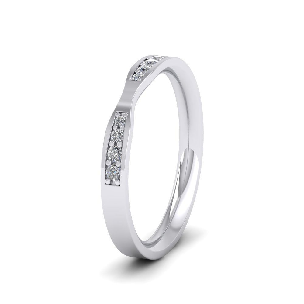 <p>9ct White Gold Pinch Shaped Flat Wedding Ring With Eight Diamonds.  25mm Wide And Court Shaped For Comfortable Fitting.  Suitable For Fitting Next To Single Stone Rings Where The Stone And Setting Protrude Up To 0.75mm Away From The Edge Of The Ring.</p>