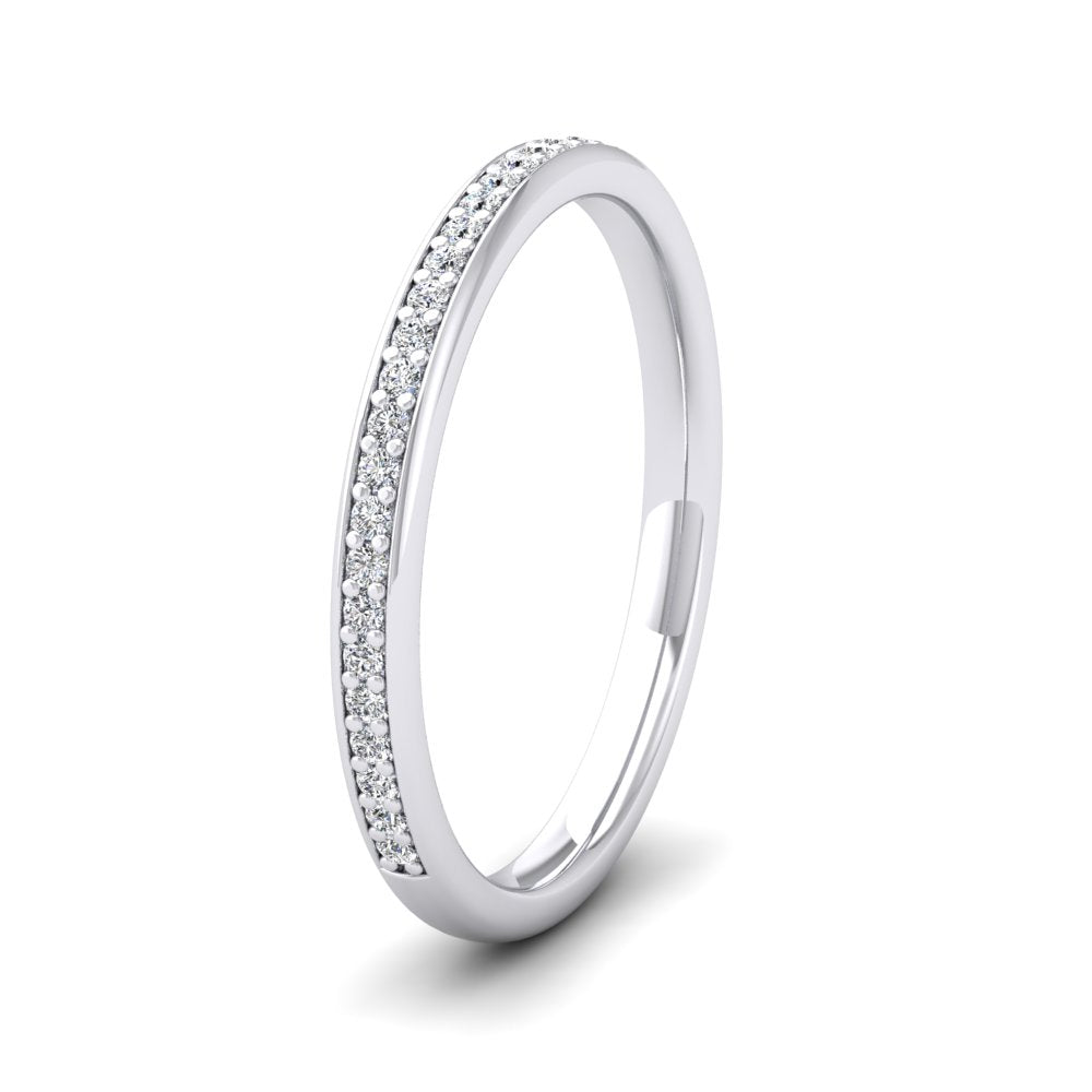 <p>18ct White Gold Half Bead Set 0.13ct Round Brilliant Cut Diamond Wedding Ring. 2mm Wide And Court Shaped For Comfortable Fitting</p>