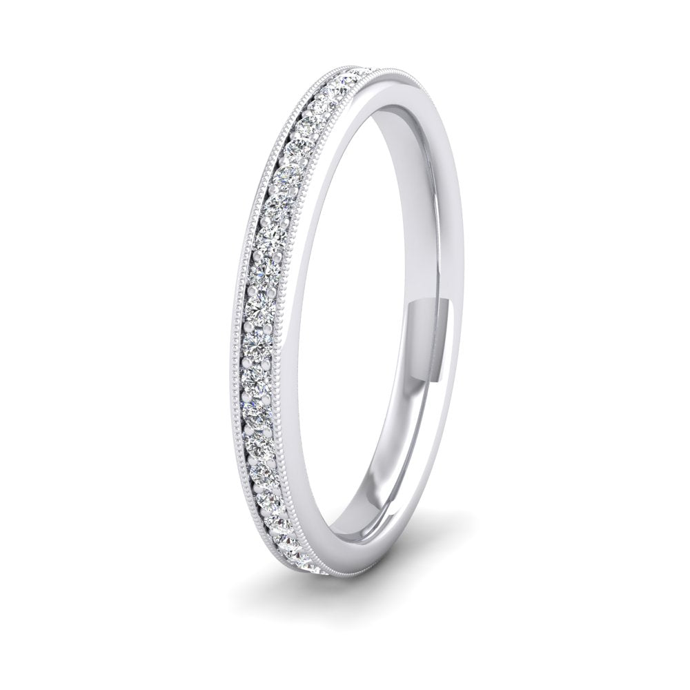 <p>18ct White Gold Full Bead Set 0.7ct Round Brilliant Cut Diamond With Millgrain Surround Wedding Ring.  25mm Wide And Court Shaped For Comfortable Fitting</p>