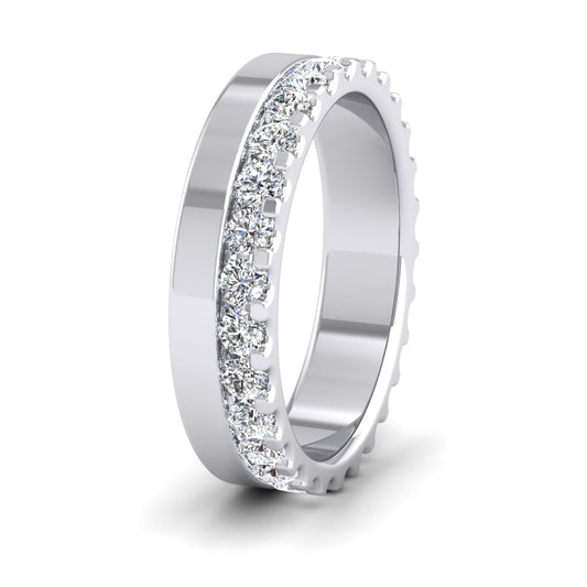 <p>950 Platinum Asymmetric Full Claw Set Diamond Ring (0.98ct) .  45mm Wide And Court Shaped For Comfortable Fitting</p>