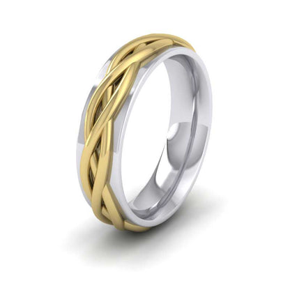 <p>Weave Twist Patterned Two Colour Flat Wedding Ring In 18ct White Gold .  6mm Wide And Court Shaped For Comfortable Fitting</p>