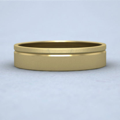 Asymmetric Line Pattern 22ct Yellow Gold 5mm Flat Wedding Ring Down View