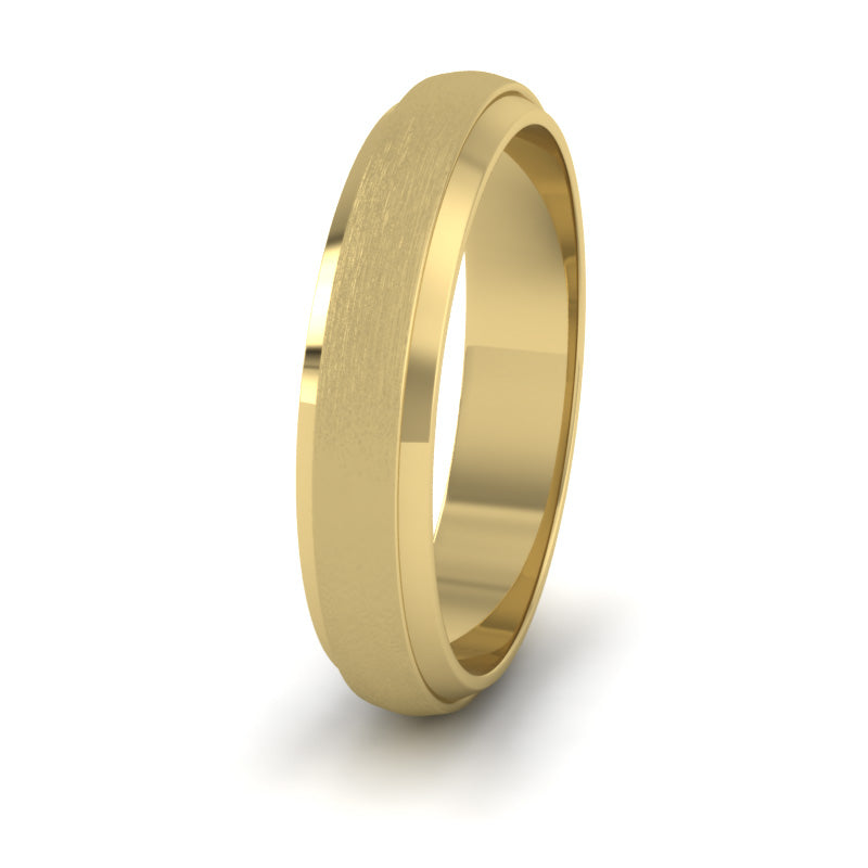 <p>18ct Yellow Gold Flat Edge Patterned And Matt Finish Wedding Ring.  4mm Wide </p>