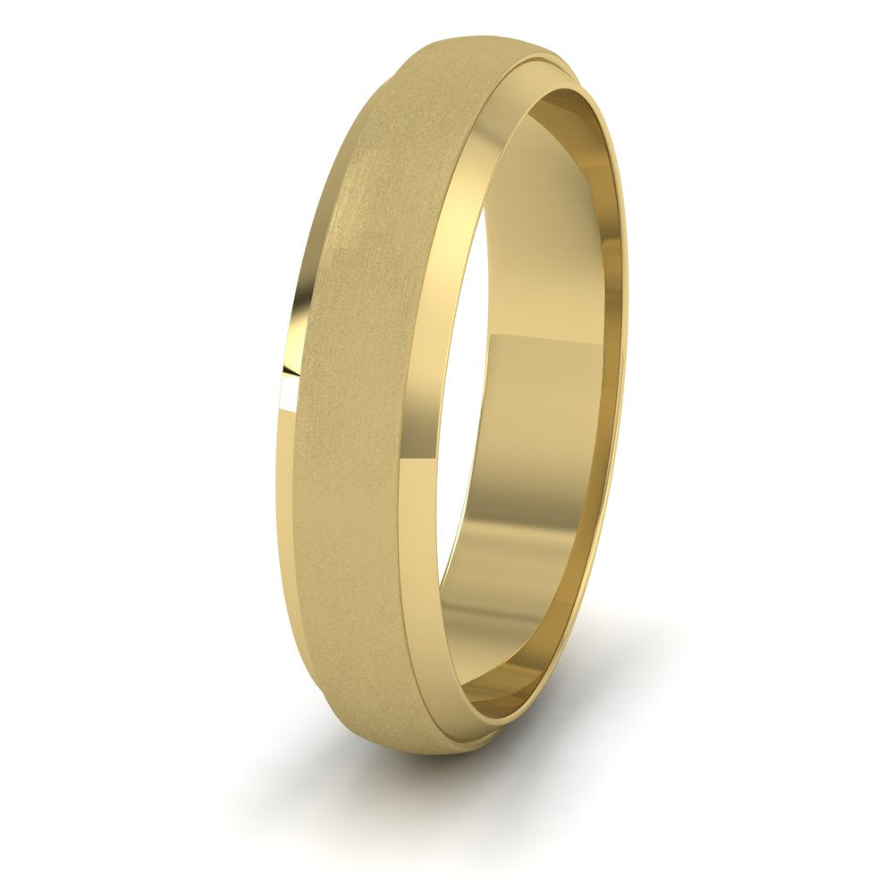 <p>18ct Yellow Gold Flat Edge Patterned And Matt Finish Wedding Ring.  5mm Wide </p>