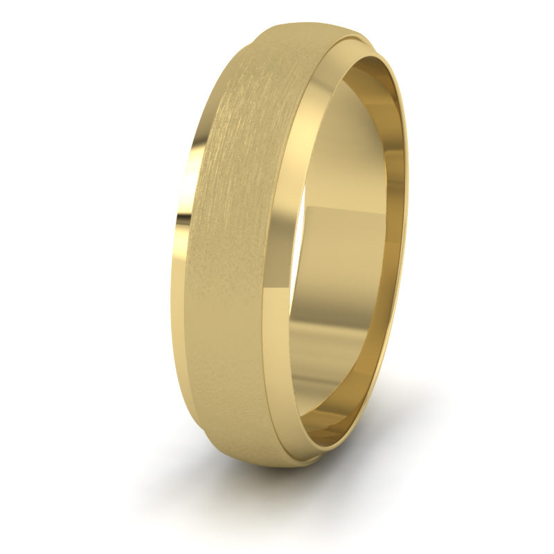 <p>18ct Yellow Gold Flat Edge Patterned And Matt Finish Wedding Ring.  6mm Wide </p>