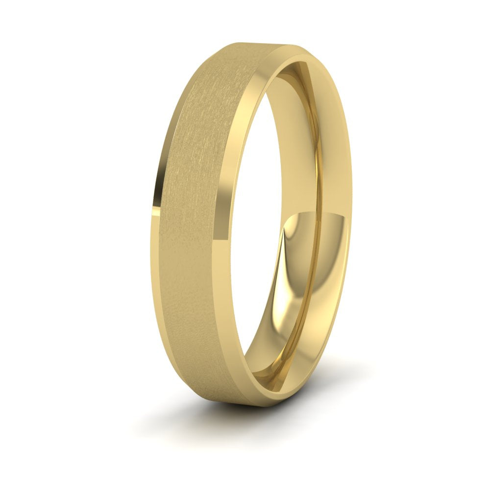 <p>18ct Yellow Gold Bevelled Edge And Matt Finish Centre Flat Wedding Ring.  5mm Wide And Court Shaped For Comfortable Fitting</p>