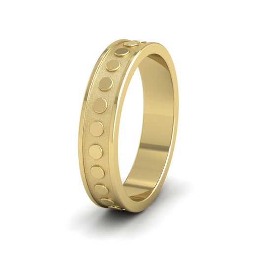 <p>22ct Yellow Gold Raised Circle And Edge Patterned Flat Wedding Ring.  5mm Wide </p>