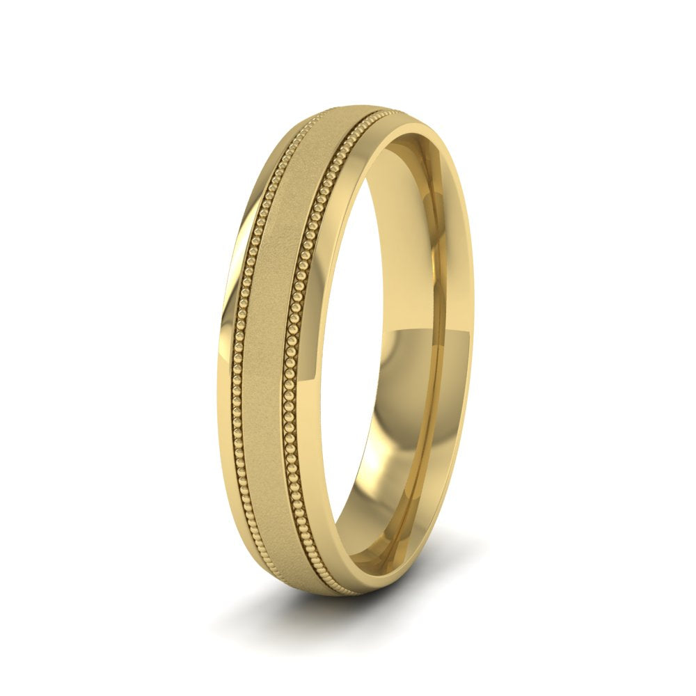 <p>18ct Yellow Gold Millgrain And Contrasting Matt And Shiny Finish Wedding Ring.  4mm Wide And Court Shaped For Comfortable Fitting</p>