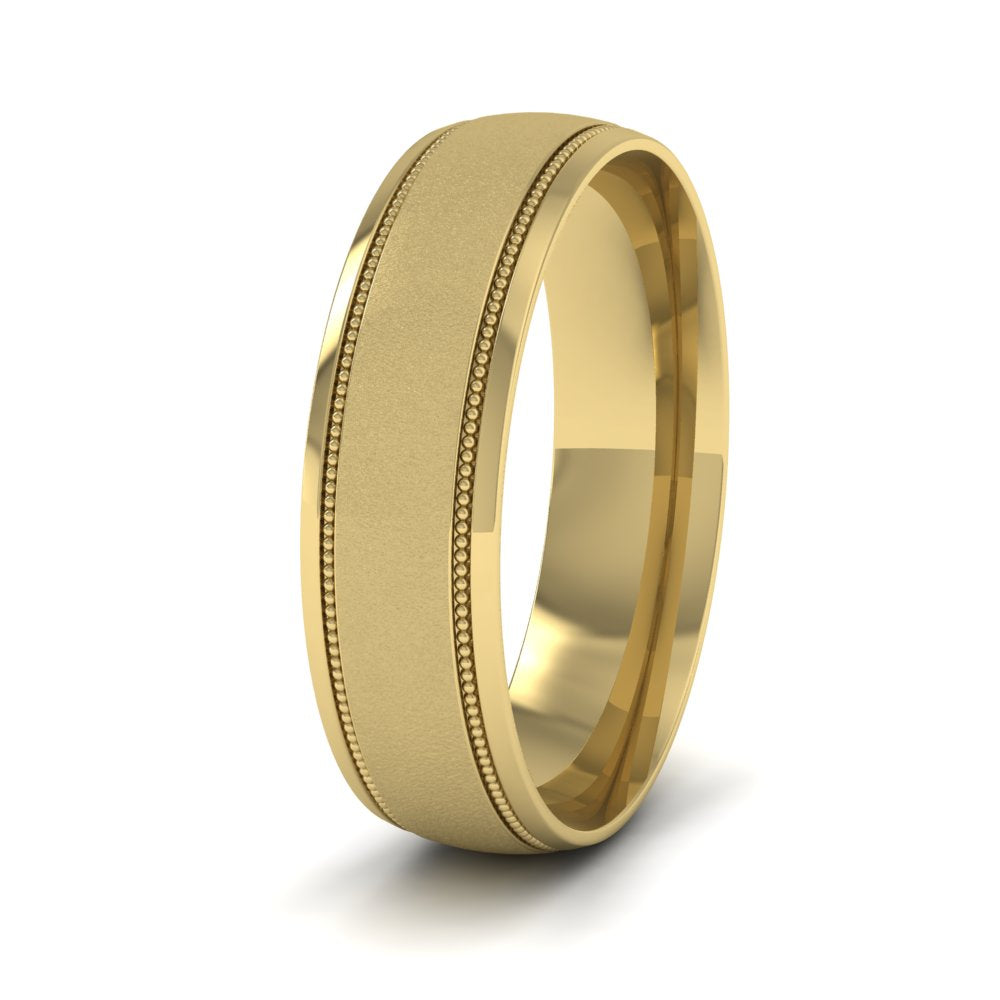 <p>18ct Yellow Gold Millgrain And Contrasting Matt And Shiny Finish Wedding Ring.  6mm Wide And Court Shaped For Comfortable Fitting</p>