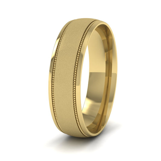 <p>14ct Yellow Gold Millgrain And Contrasting Matt And Shiny Finish Wedding Ring.  6mm Wide And Court Shaped For Comfortable Fitting</p>